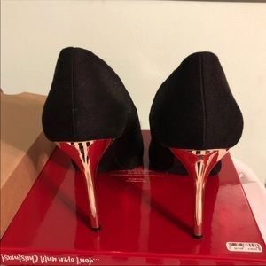 Black and gold heels